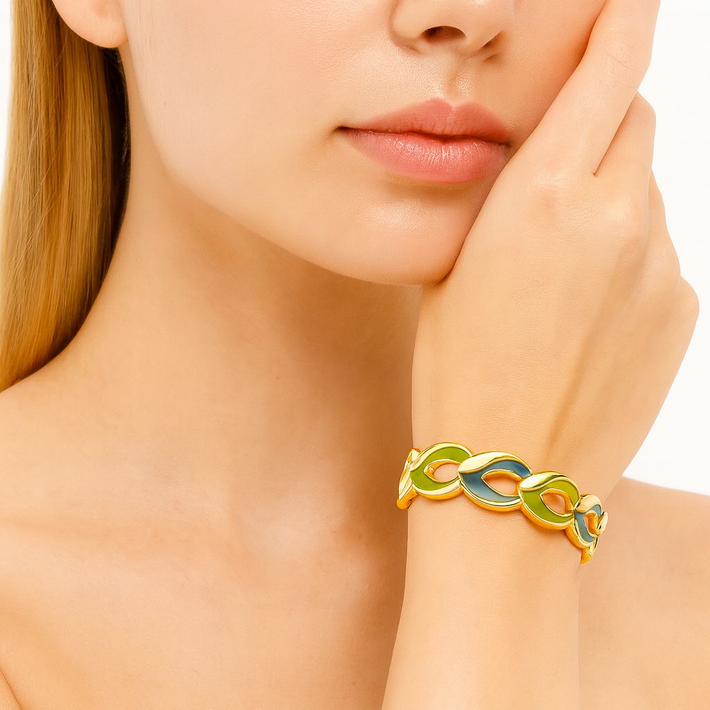 Model wearing colorful gold enamel bracelet on wrist