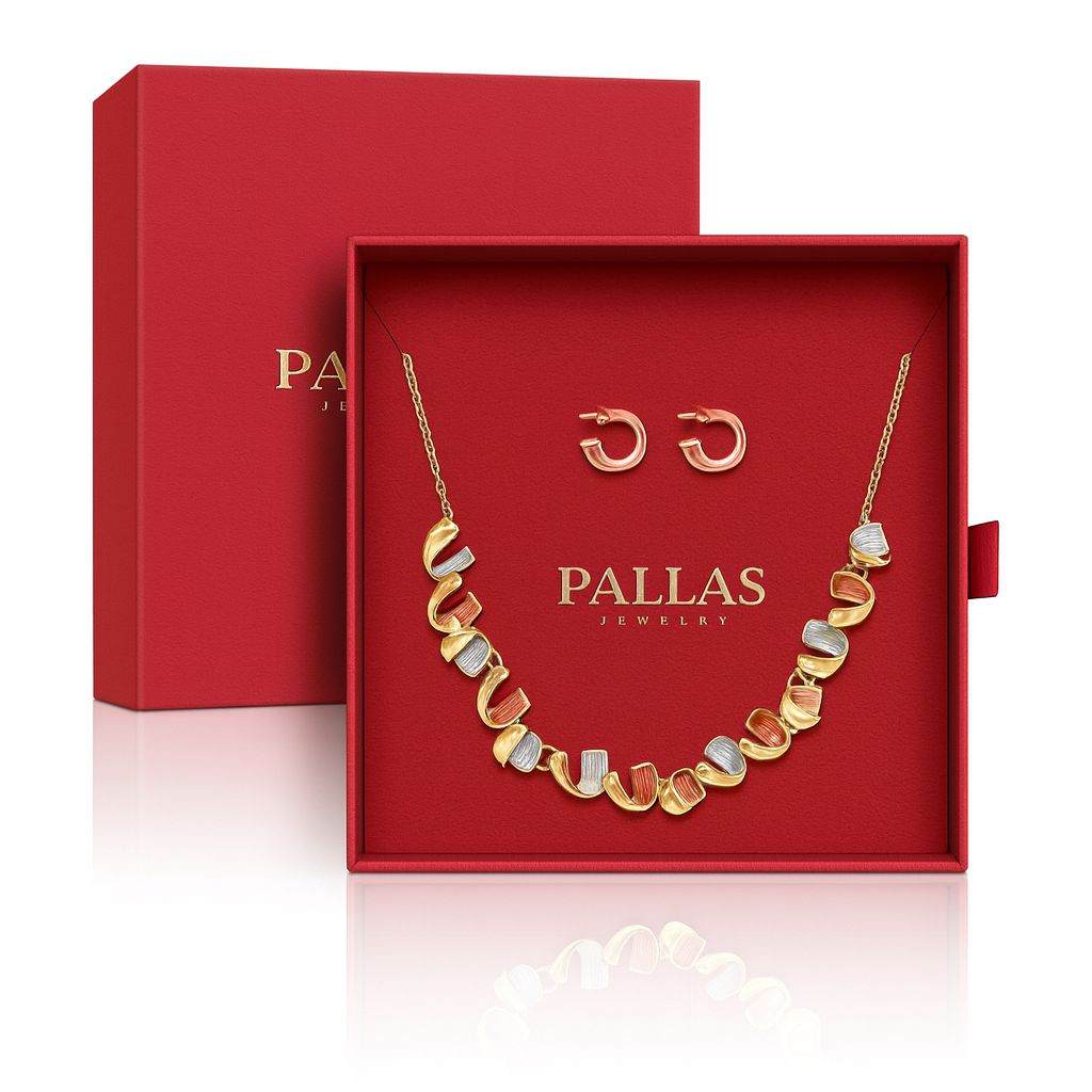 Women’s gold circle jewelry set with multi-tone necklace and matching earrings in a red gift box