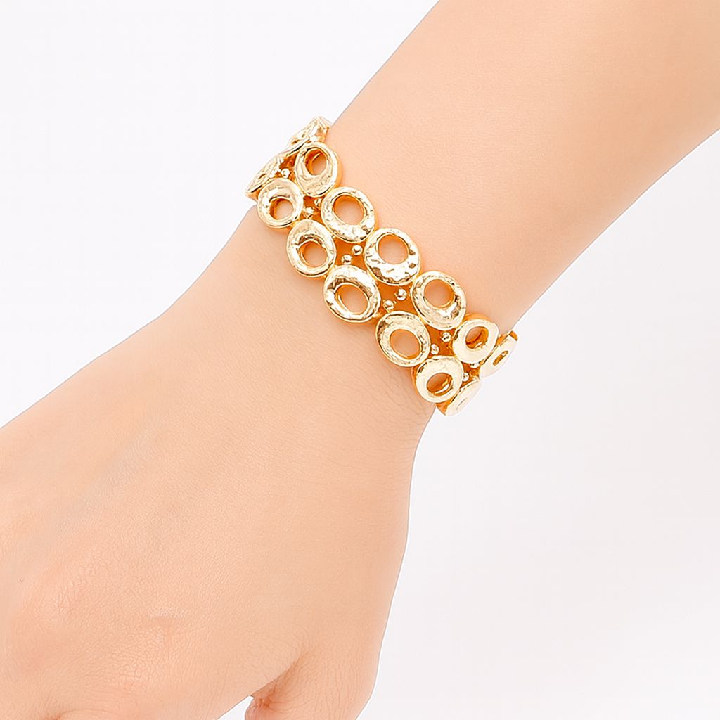 KC gold plated fashion bracelet with round open shapes