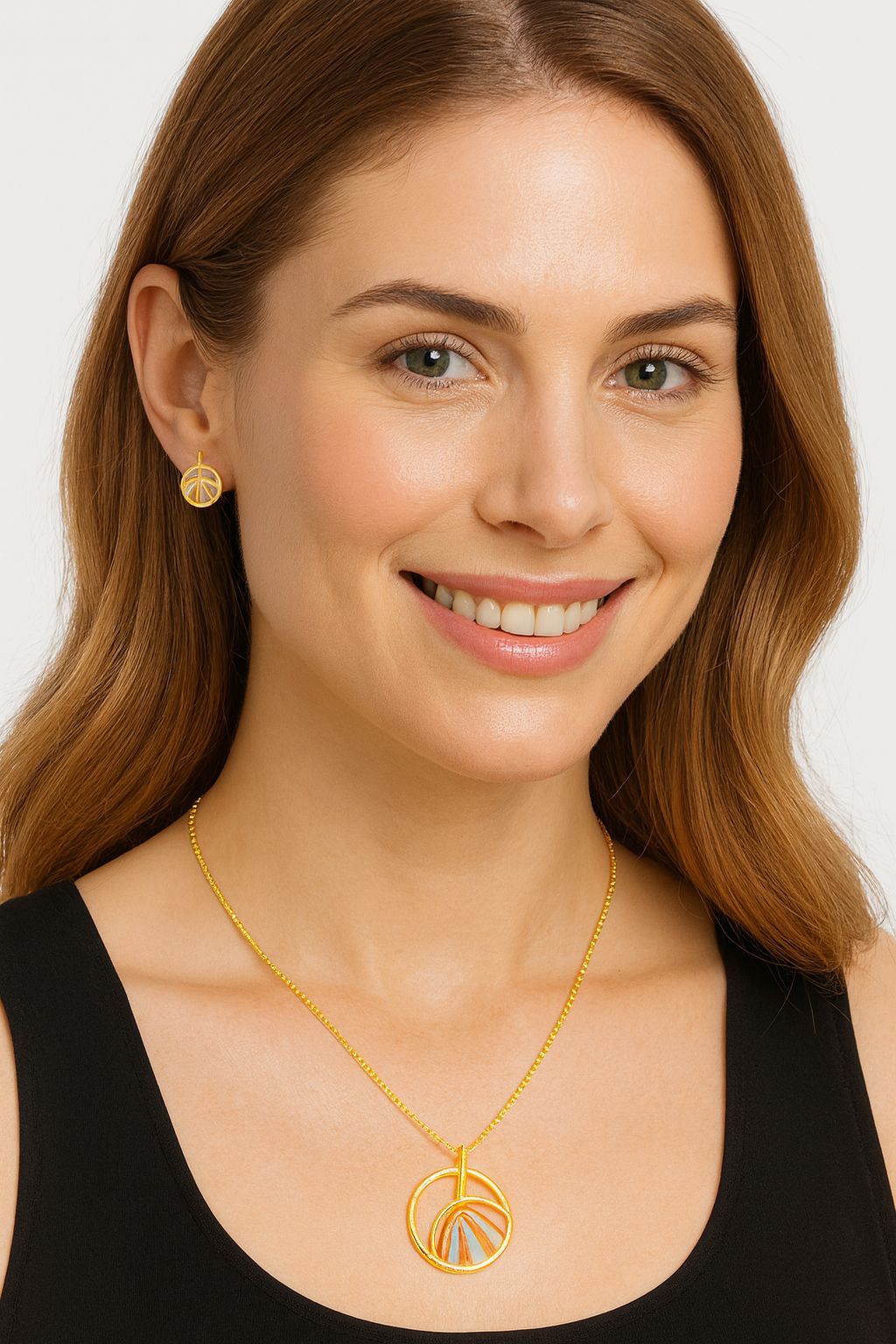 Model wearing hand-painted enamel round necklace and earrings