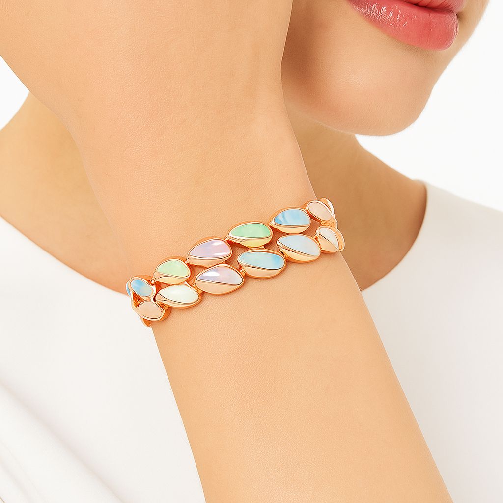 Woman wearing colorful pastel enamel bracelet on wrist