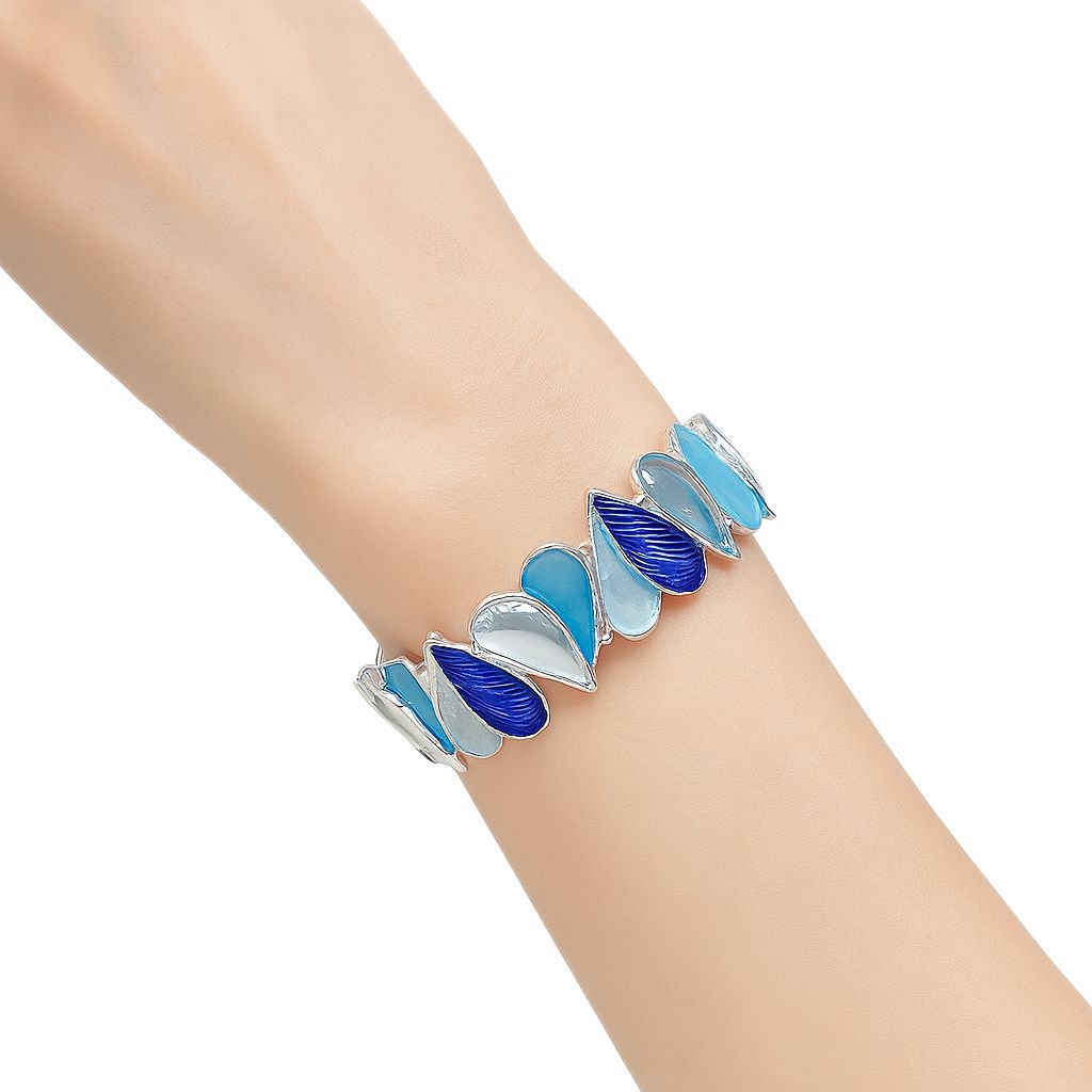 Model wearing ocean-inspired blue teardrop bracelet