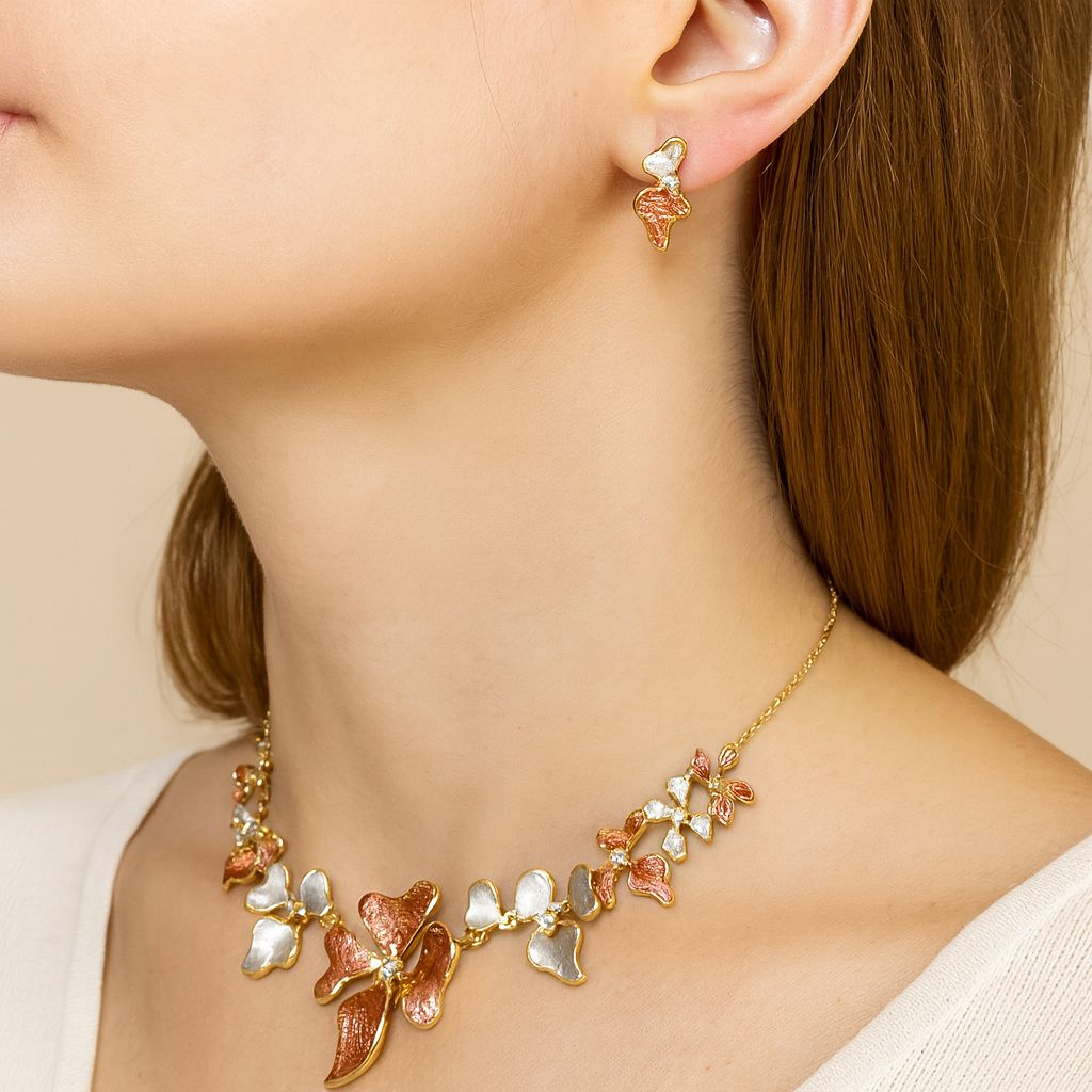 Close-up of hand-painted petal butterfly necklace design