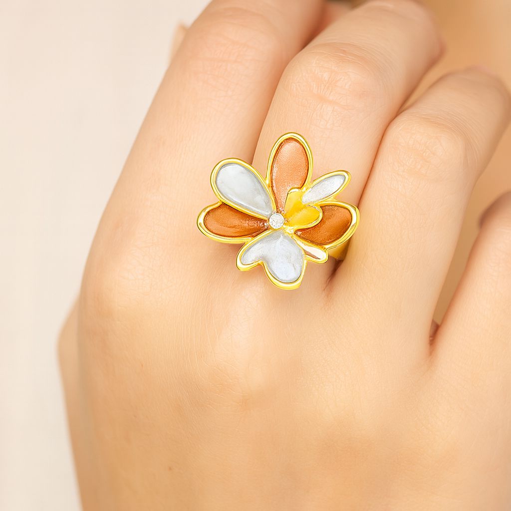 Model wearing adjustable KC gold flower statement ring