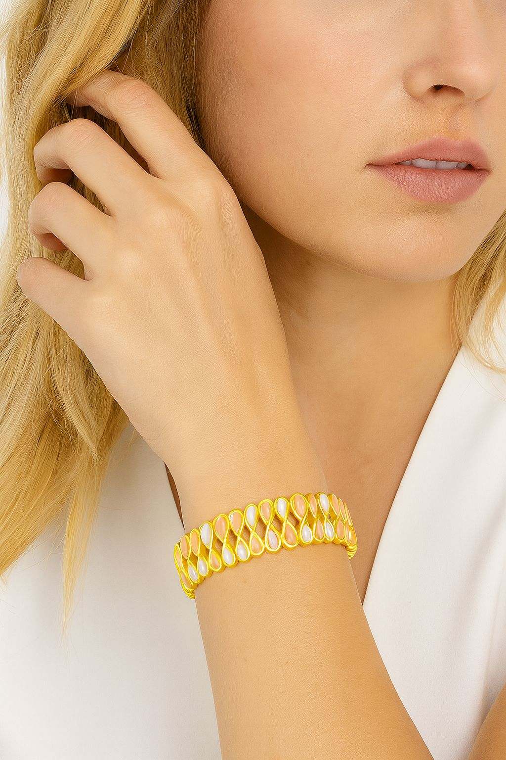 Model wearing pastel enamel teardrop bracelet